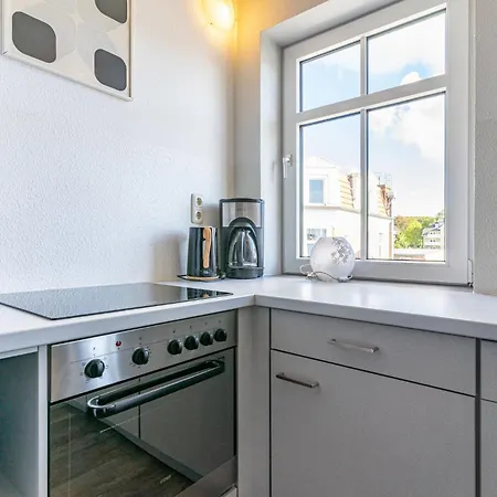 - 9 Im Appartementhaus Hafenriff